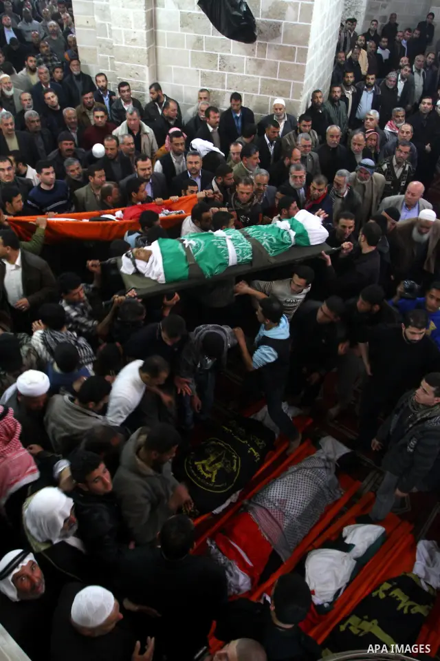 Palestinian mourners attend a funeral at a mosque in Gaza City on March 23, 2011 a day after eight Gazans were killed, among them two minors and four militants, as tensions soared on the border with Israel after days of...