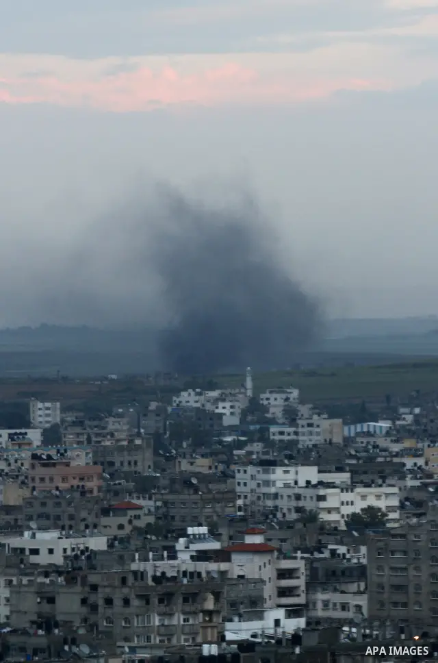 Smoke is seen over the eastern Gaza city on March 24,2011 as Palestinian militants launch rockets towards Israel. Photo by Ashraf Amra