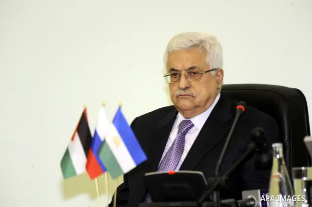 Palestinian President Mahmoud Abbas is given an honorary doctorate degree from University of Ufa in Bashkiria on March 24,2011. Photo by Thaer Ganaim