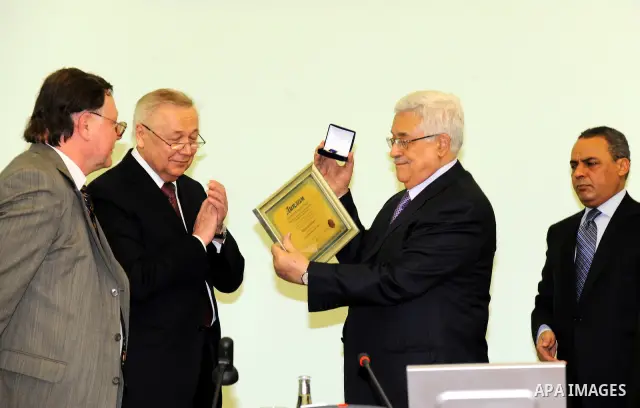 Palestinian President Mahmoud Abbas is given an honorary doctorate degree from University of Ufa in Bashkiria on March 24,2011. Photo by Thaer Ganaim