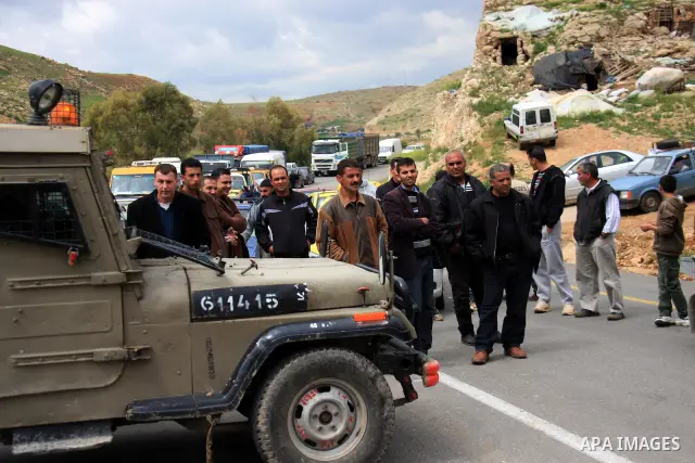 Israeli troops shut down al-Hamra checkpoint during a military operation searching for explosives on the outskirts of the West Bank Jordan Valley, Friday, March 25, 2011. Photo by Wagdi Eshtayah