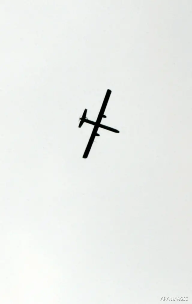 An Israeli drone is seen over the city of Rafah in the southern Gaza Strip on March 25,2011, as Israeli aircraft attacked four targets in the Gaza Strip during the night, lightly wounding three people, in response to Pal...