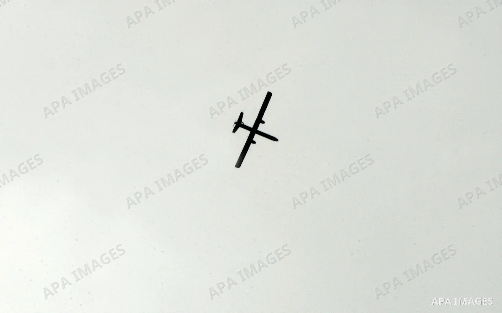 An Israeli drone is seen over the city of Rafah in the southern Gaza Strip on March 25,2011, as Israeli aircraft attacked four targets in the Gaza Strip during the night, lightly wounding three people, in response to Pal...