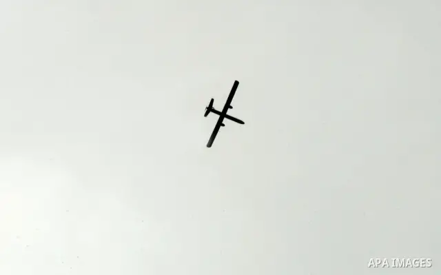 An Israeli drone is seen over the city of Rafah in the southern Gaza Strip on March 25,2011, as Israeli aircraft attacked four targets in the Gaza Strip during the night, lightly wounding three people, in response to Pal...