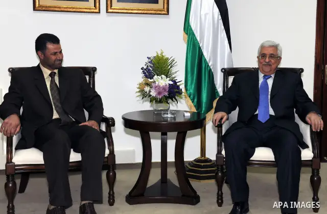 Palestinian President Mahmoud Abbas (Abu Mazen) meets with Abdullah Abu Rahmah, head of the Popular Committee Against the Wall, west bank the city of Ramallah March 26, 2011. photo by thaer ganaim