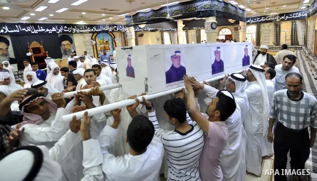 Pro-reforms protesters march during the funeral of 71-year-old Isa Mohammed in Maamer village south east of the capital Manama, Bahrain, 26 March 2011. According to local media reports, Mohammed died on 25 March after te...