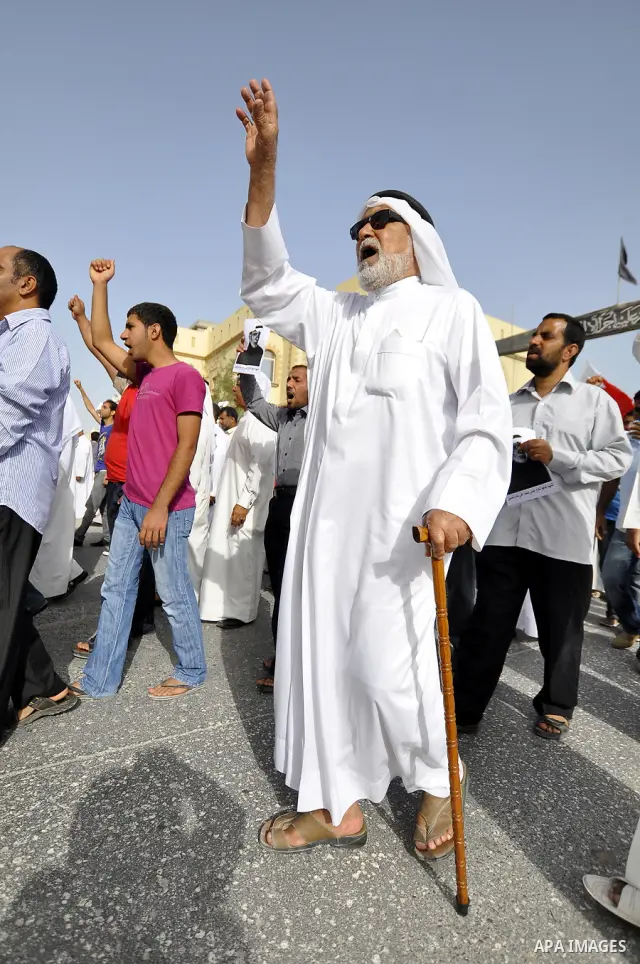 Pro-reforms protesters march during the funeral of 71-year-old Isa Mohammed in Maamer village south east of the capital Manama, Bahrain, 26 March 2011. According to local media reports, Mohammed died on 25 March after te...