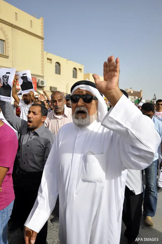 Pro-reforms protesters march during the funeral of 71-year-old Isa Mohammed in Maamer village south east of the capital Manama, Bahrain, 26 March 2011. According to local media reports, Mohammed died on 25 March after te...