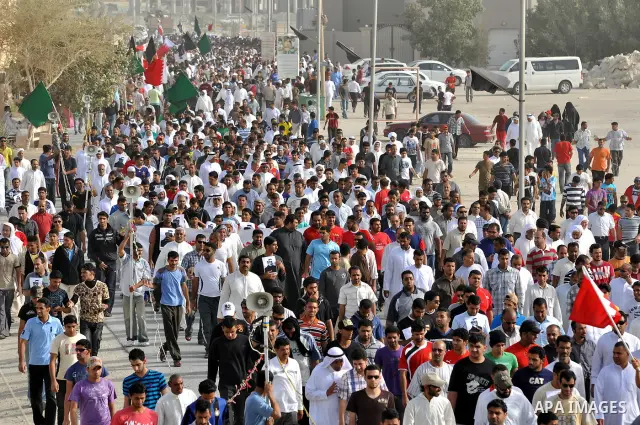 Pro-reforms protesters march during the funeral of 71-year-old Isa Mohammed in Maamer village south east of the capital Manama, Bahrain, 26 March 2011. According to local media reports, Mohammed died on 25 March after te...