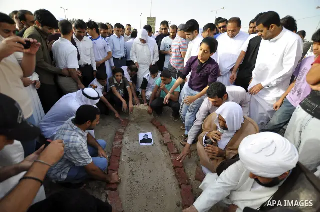 Pro-reforms protesters march during the funeral of 71-year-old Isa Mohammed in Maamer village south east of the capital Manama, Bahrain, 26 March 2011. According to local media reports, Mohammed died on 25 March after te...