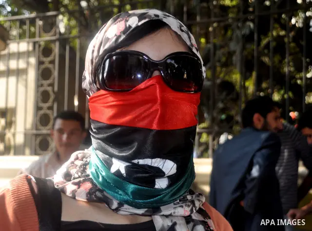 Libyans living in Egypt demonstrate against the Libyan leader Muammar Gaddafi forces and in support of rebels, outside the Arab League headquarters in Cairo, Egypt Sunday, March 27, 2011. Forces loyal to Libyan leader Mu...