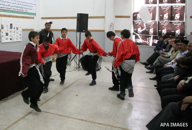 Palestinians take part in a festival under the title 'yes to life, yes to sports, no drug', in Al-Ram in the West Bank with the participation of the Directorate of Education and Jerusalem Institute and under the auspices...
