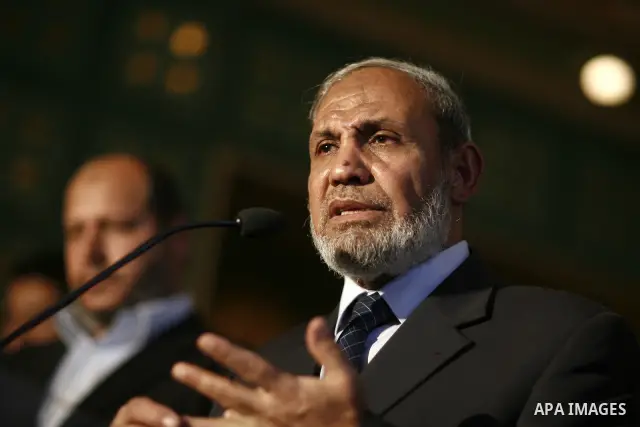Palestinian Hamas' leader from Gaza, Mahmoud Zahar meets with the Arab League chief Amr Moussa during a press conference at the Arab League headquarters in Cairo, Egypt, Tuesday, March 29, 2011. Photo by Wissam Nassar