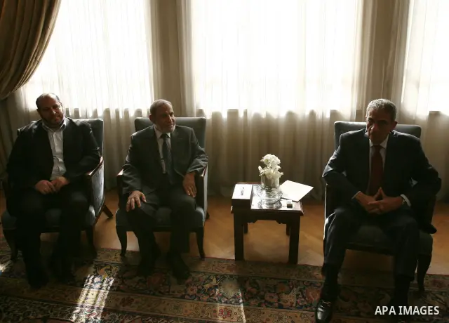 Palestinian Hamas' leader from Gaza, Mahmoud Zahar meets with the Arab League chief Amr Moussa during a press conference at the Arab League headquarters in Cairo, Egypt, Tuesday, March 29, 2011. Photo by Wissam Nassar