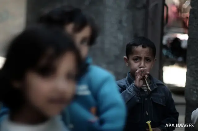 Palestinians refugees children are pictured playing in the alley of al Shatea refugee camp in the west of Gaza City on 29 March 2011. Photo by Mustafa Hassona