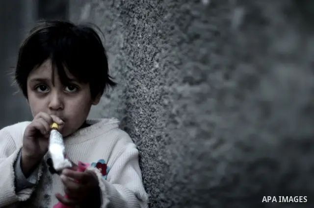 Palestinians refugees children are pictured playing in the alley of al Shatea refugee camp in the west of Gaza City on 29 March 2011. Photo by Mustafa Hassona