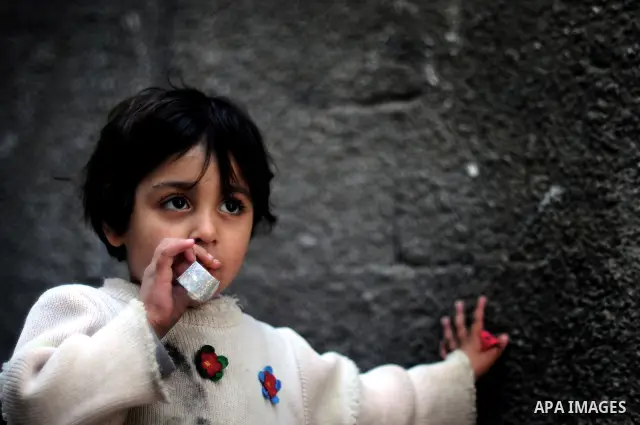 Palestinians refugees children are pictured playing in the alley of al Shatea refugee camp in the west of Gaza City on 29 March 2011. Photo by Mustafa Hassona