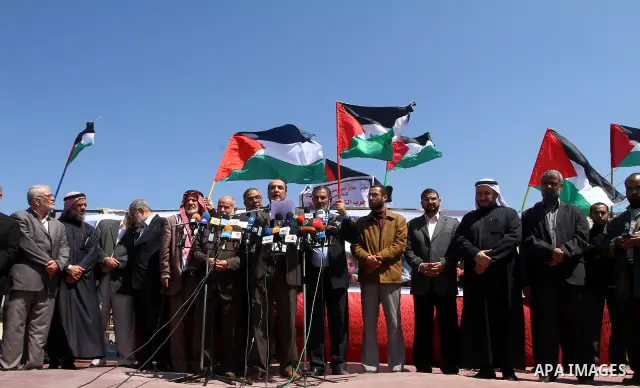 Palestinians Hamas leaders take a part in a sit-in in Beit Hanun, northern Gaza Strip, on March 30, 2011 as hundreds of people across Israel and Palestinian territories were holding a series of rallies marking 'Land Day,...