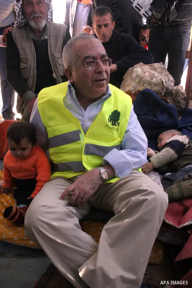 Palestinian prime minister Salam Fayyad during his visits in the southern town of Yatta, near Hebron in the occupied West Bank, on March 30, 2011, as hundreds of people across Israel and Palestinian territories were hold...