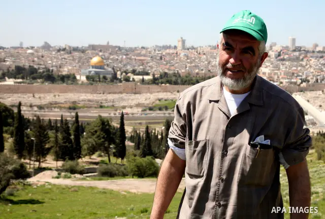 Sheikh Raed Salah and other Palestinians plant olive trees at the Mount of Olives, in East Jerusalem to mark the Land Day on March 30,2011, as hundreds of people across Israel and Palestinian territories were holding a s...