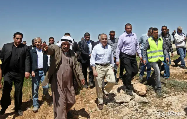 Palestinian prime minister Salam Fayyad visits the southern town of Yatta, near Hebron in the occupied West Bank, on March 30, 2011, as hundreds of people across Israel and Palestinian territories were holding a series o...