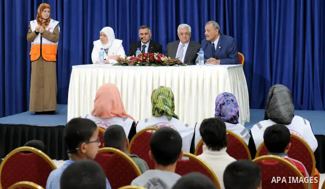 Palestinian President Mahmoud Abbas (Abu Mazen) meets with students of the full contact of the Red Crescent, west bank city of Ramallah March, 31,2011. photo by thaer ganaim