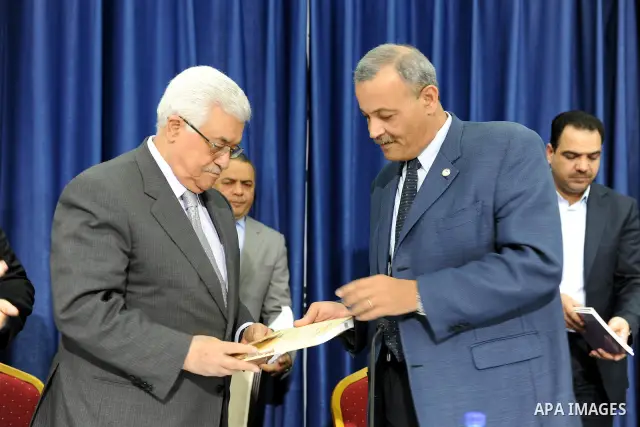Palestinian President Mahmoud Abbas (Abu Mazen) meets with students of the full contact of the Red Crescent, west bank city of Ramallah March, 31,2011. photo by thaer ganaim