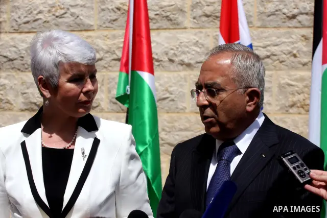 Palestinian Prime Minister Salam Fayyad and his Croatian counterpart Jadranka Kosor attend a joint press conference after their meeting in the West Bank city of Ramallah, on March 31, 2011. Photo by Issam Rimawi