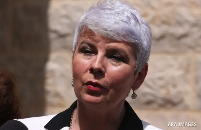 Croatian Prime Minister Jadranka Kosor attends a welcoming ceremony in the West Bank town of Ramallah, 31 March 2011. Kosor arrived to Ramallah for official meetings with the Palestinian leadership on the second day of h...