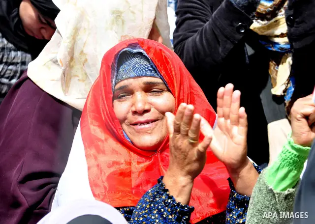 Egyptian protesters participate in a demonstration at the Tahrir square in Cairo, Egypt, Friday, April 1,2011, to call for Egypt's military government to harshly punish members of ex-President Hosni Mubarak's former admi...