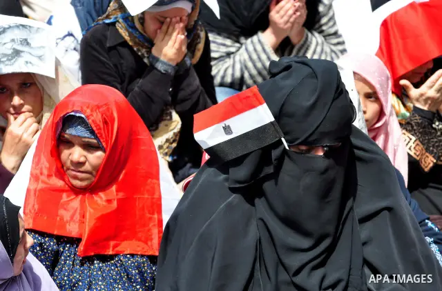 Egyptian protesters participate in a demonstration at the Tahrir square in Cairo, Egypt, Friday, April 1,2011, to call for Egypt's military government to harshly punish members of ex-President Hosni Mubarak's former admi...
