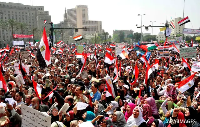 Egyptian protesters participate in a demonstration at the Tahrir square in Cairo, Egypt, Friday, April 1,2011, to call for Egypt's military government to harshly punish members of ex-President Hosni Mubarak's former admi...