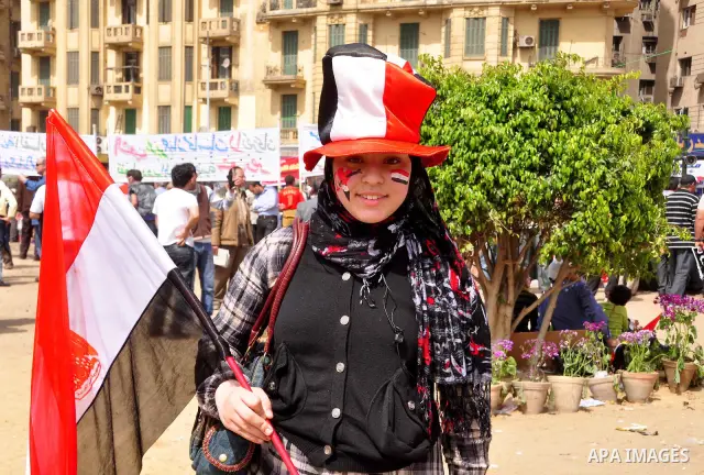 Egyptian protesters participate in a demonstration at the Tahrir square in Cairo, Egypt, Friday, April 1,2011, to call for Egypt's military government to harshly punish members of ex-President Hosni Mubarak's former admi...