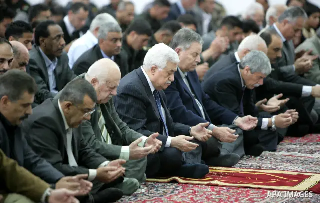 Palestinian President Mahmoud Abbas (Abu Mazen) attends Friday prayers in the West Bank city of Ramallah on April 1,2011. Photo by Thaer Ganaim