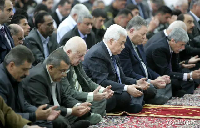 Palestinian President Mahmoud Abbas (Abu Mazen) attends Friday prayers in the West Bank city of Ramallah on April 1,2011. Photo by Thaer Ganaim