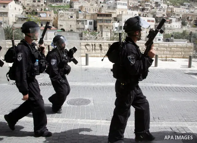 Israeli riot police who deploy in the Silwan neighborhood in East Jerusalem after Friday prayers on 01 April 2011 as Palestinian protesters gather for a demonstration. A few stones were thrown and a few rounds of tear ga...