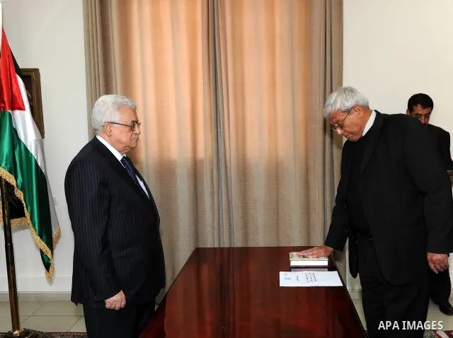Members of Fatah Movement's court swear in front of Palestinian President Mahmoud Abbas (Abu Mazen) in the West Bank city of Ramallah on April 1,2011. Photo by Thaer Ganaim