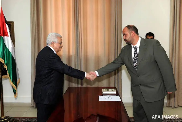 Members of Fatah Movement's court swear in front of Palestinian President Mahmoud Abbas (Abu Mazen) in the West Bank city of Ramallah on April 1,2011. Photo by Thaer Ganaim