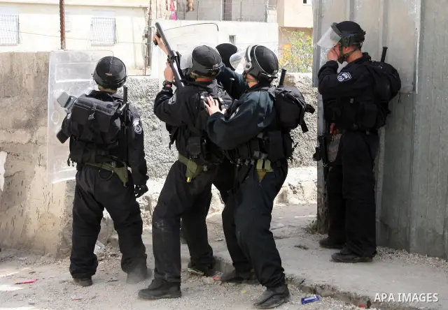 Israeli riot police who deploy in the Silwan neighborhood in East Jerusalem after Friday prayers on 01 April 2011 as Palestinian protesters gather for a demonstration. A few stones were thrown and a few rounds of tear ga...