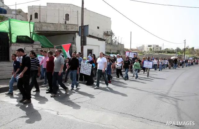 Left-wing activists take part in the weekly protest to show solidarity with Palestinians against a Jewish settlement in the Sheikh Jarrah neighbourhood in East Jerusalem April 1, 2011. Photo by Sliman Khader..