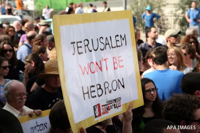 Left-wing activists take part in the weekly protest to show solidarity with Palestinians against a Jewish settlement in the Sheikh Jarrah neighbourhood in East Jerusalem April 1, 2011. Photo by Sliman Khader..