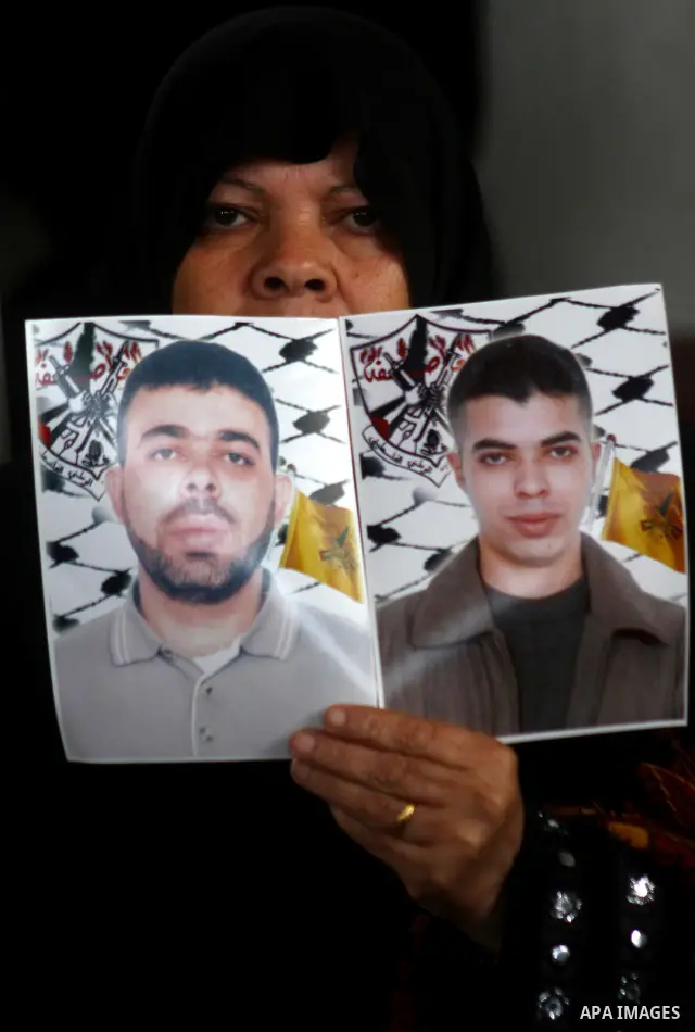 A Palestinian woman attends a protest calling for the release of Palestinian prisoners from Israeli jails , in Gaza City on April 4, 2011. About 7,500 Palestinian prisoners are held in Israeli jails. Photo by Ashraf Amra