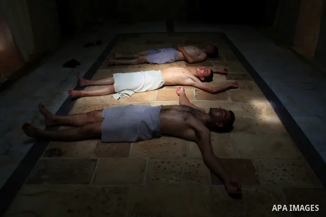 Palestinians enjoy steam bath at the 400-year-old traditional Turkish bath ''Hamam Alshefa'' in the West Bank City of Nablus on April 3,2011. Photo by Wagdi Eshtayah