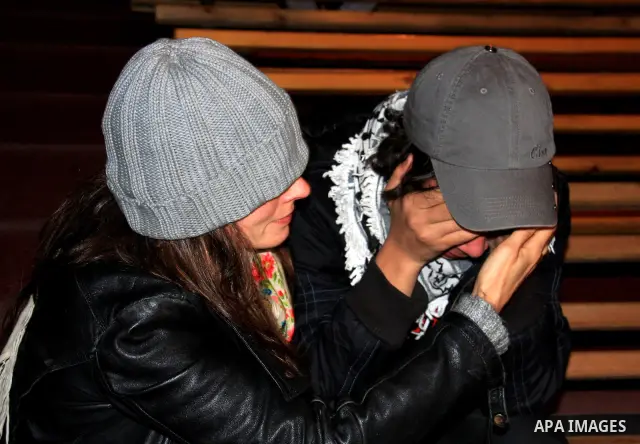 Palestinian women also workers in the Freedom Theatre in Jenin, weep on the death of Arab-Israeli actor and director Juliano Mer Khamis during a rally inside the Freedom Theatre, owned by Mer Khamis, in Jenin refugee cam...