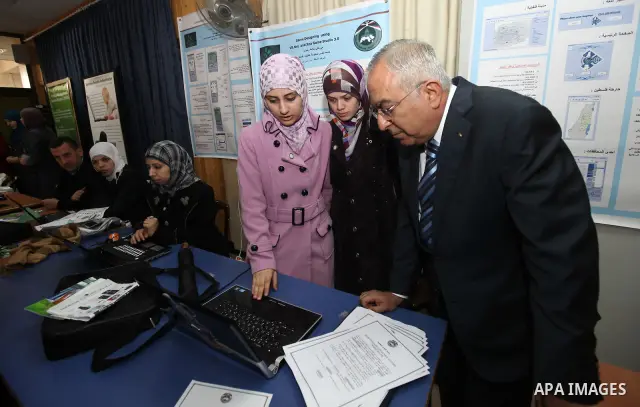 Palestinian Pime Minister, Salam Fayyad attends the opening ceremony of the Palestinian ICT Exhibition at Birzeit University in the West Bank city of Ramallah on April 5, 2011. Photo by Mustafa Abu Dayeh