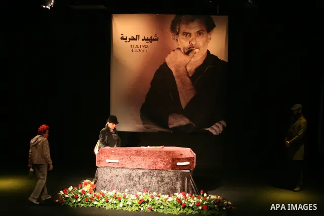 Mourners react as they gather around the coffin of Israeli Palestinian actor, director, filmmaker and political activist Juliano Mer-Khamis, who was shot dead in the West Bank refugee camp of Jenin on Monday, during his...