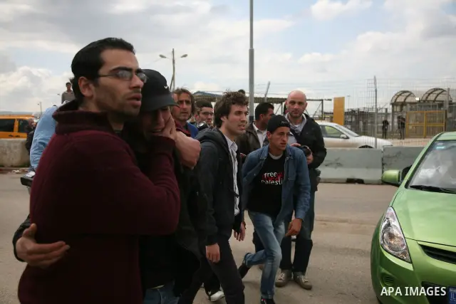 People mourn the Arab-Israeli actor and director Juliano Mer Khamis during a funeral procession near al-Midan theater in the northern Israeli city of Haifa April 6, 2011. Mer-Khamis was gunned down Monday in the West Ban...