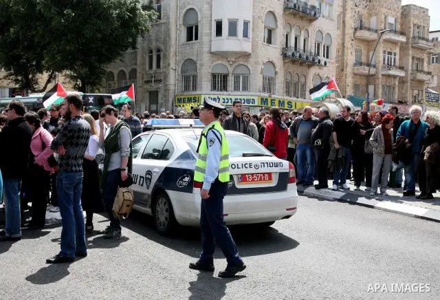 People mourn the Arab-Israeli actor and director Juliano Mer Khamis during a funeral procession near al-Midan theater in the northern Israeli city of Haifa April 6, 2011. Mer-Khamis was gunned down Monday in the West Ban...