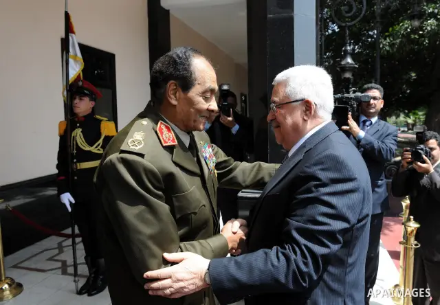 Palestinian President Mahmoud Abbas (Abu Mazen) and Field Marshal Hussein Tantawi, head of the Egyptian Armed Forces Supreme Council during their meeting in the ministry of defense headquarters in Cairo, Egypt, Thursday,...