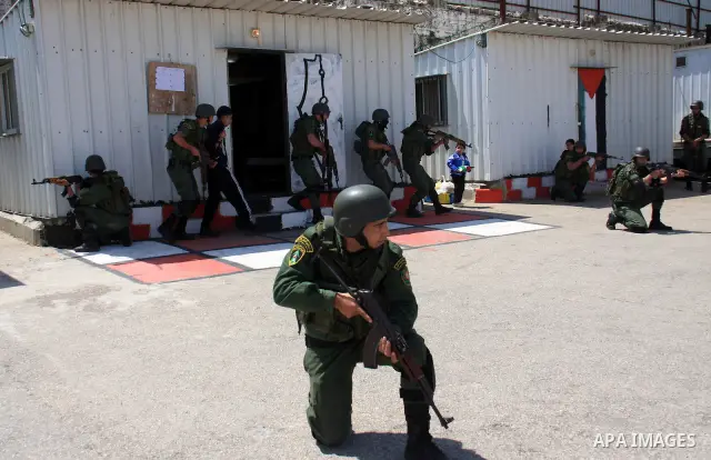 Palestinian police officers loyal to Palestinian President Mahmoud Abbas take part in a training session in the West Bank city of Nablus, Thursday on April 7, 2011. Photo by Wagdi Eshtayah